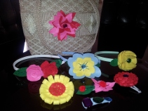 Hair accessories and bag decorated with felt flowers