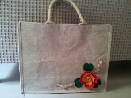 Bag decorated with felt flower